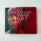 Cover of IRR/RESPEKTIV by South African artist Kendell Geers, featuring a red portrait with bold white typography