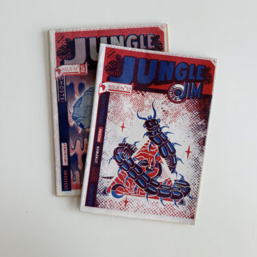 Two vintage issues of Jungle Jim African pulp fiction zine (No. 13 and No. 26) printed via red and blue risograph on newsprint, stacked on a white surface.