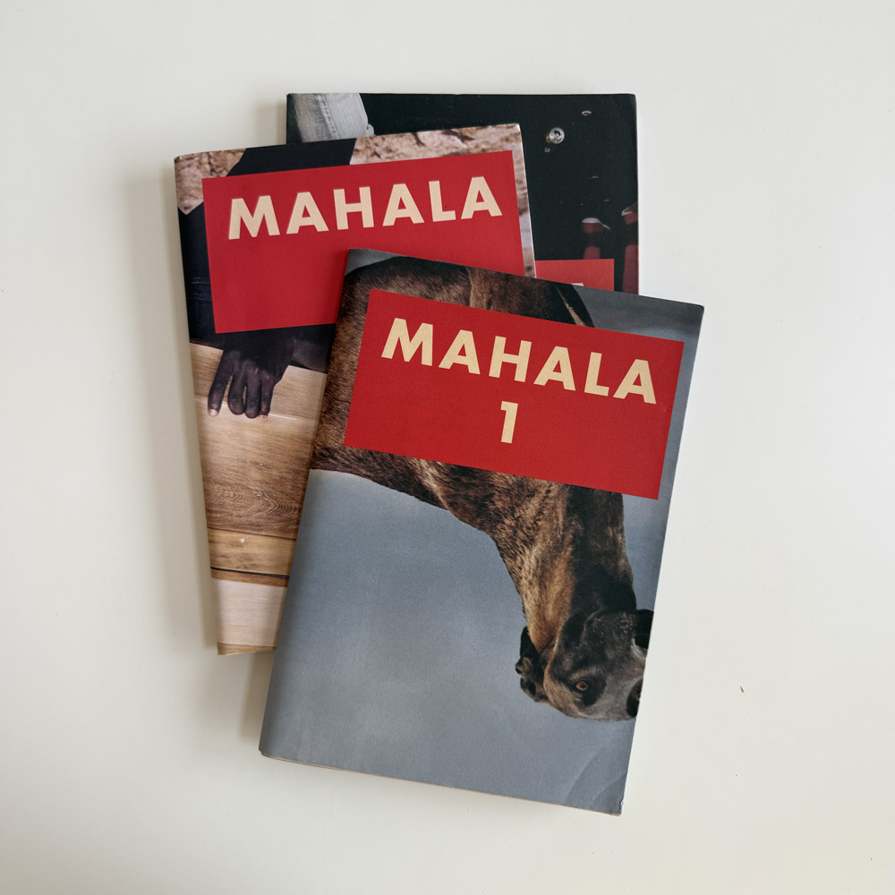 mahala-magazine-print-issues-colophon Three vintage issues of Mahala South African counter-culture magazine (Issues 1, 3, and 4) featuring bold red name plates on a white background.